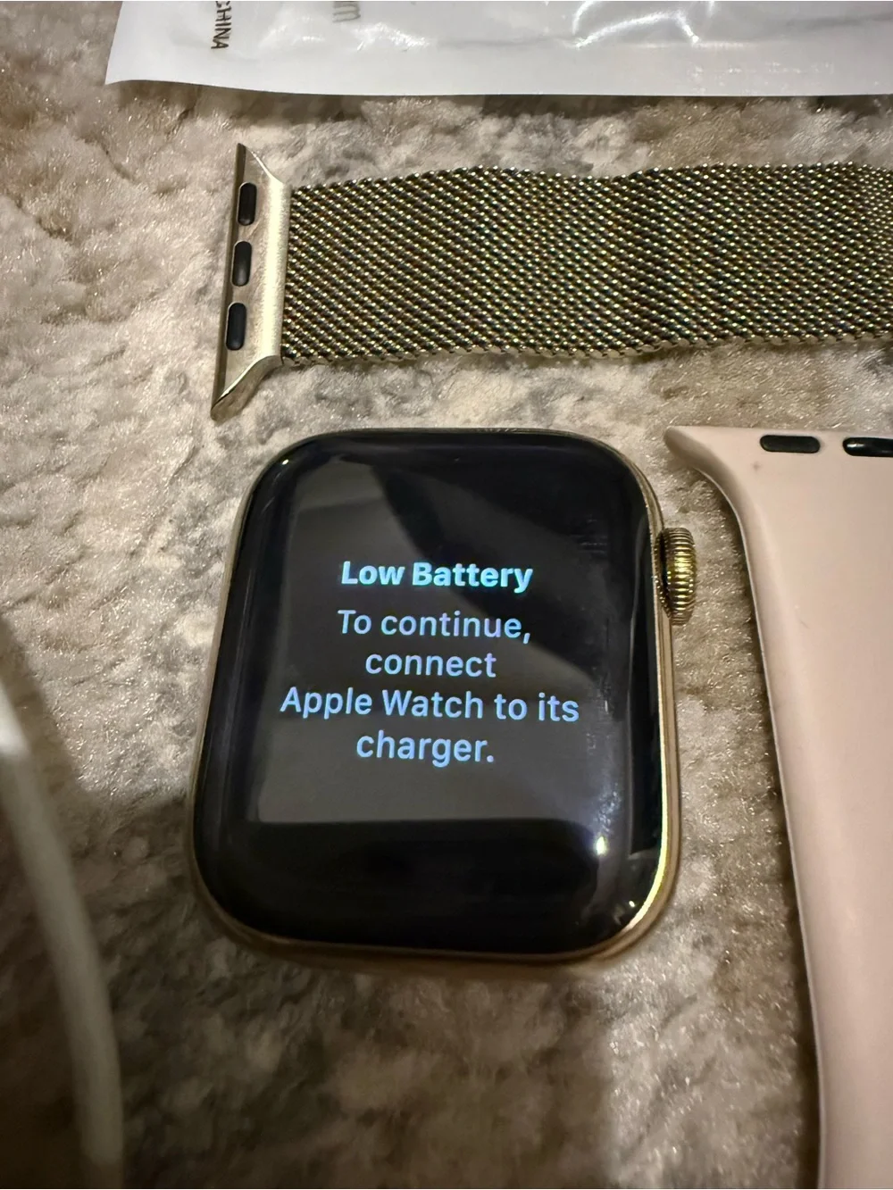 Apple Watch with Silver Milanese and Pastel Blue & Pink Sport Bands